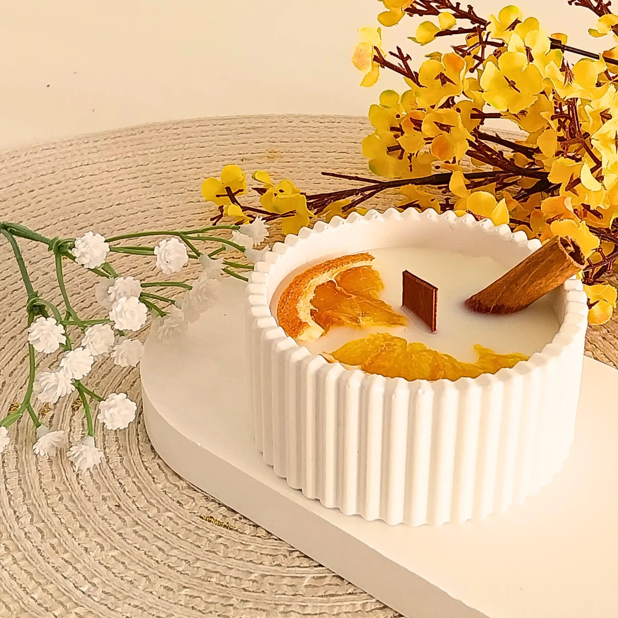 velas aromaticas de aroma a naranja y canela para decorar tu hogar en madrid